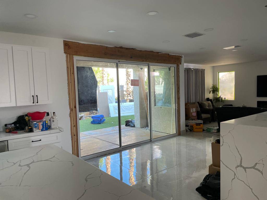 Finished multi-panel sliding door, exterior close-up